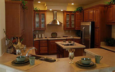 Interior view of kitchen with brown wooden cabinets